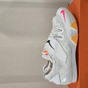 Nike White and Pink Athletic Shoes with Mesh Design